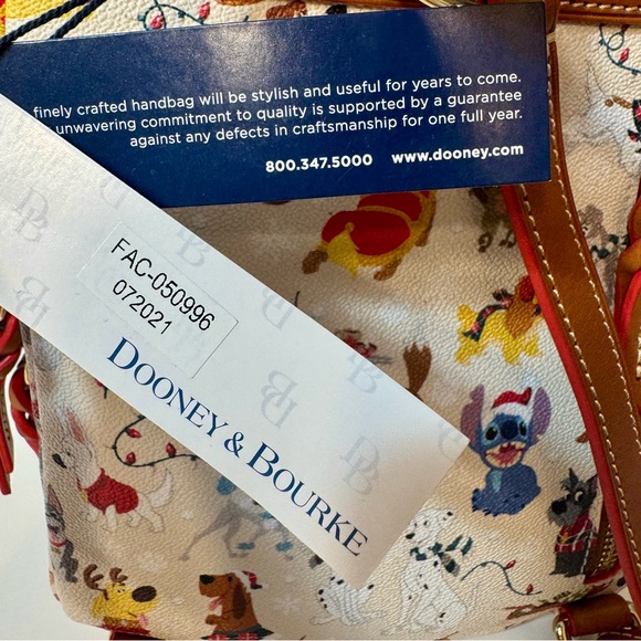 NWT. Disney Dogs Dooney & Bourke Bag - Santa Tails Backpack. Disney leather bag - Picture 13 of 16
